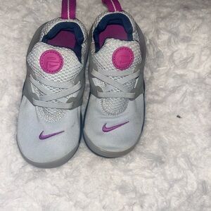 Nike Sneakers in White and Purple with Slip-On Design